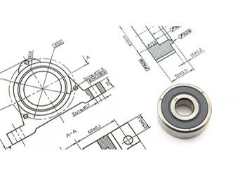 Drawing of a prototype for a bearing and a completed bearing